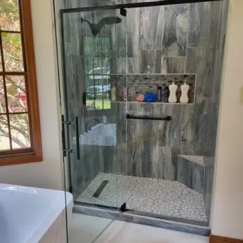 Glass shower with tile interior