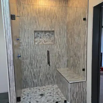 Modern glass shower with bench