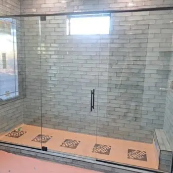 Glass shower enclosure tiled interior