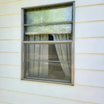 Window with white curtains outside