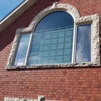Brick house with arched window