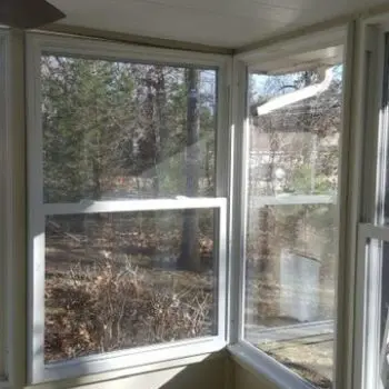 Sunlit room with large windows