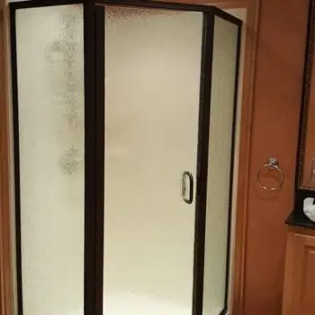 Corner frosted glass shower enclosure