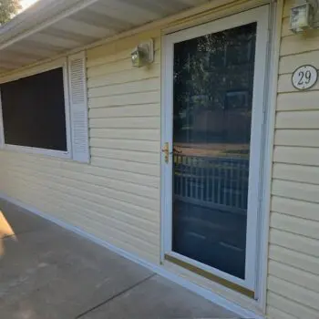 House entrance with glass door