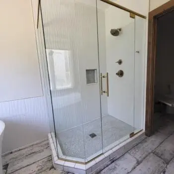 Glass shower with gold trim