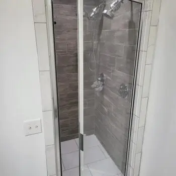Glass shower door open bathroom
