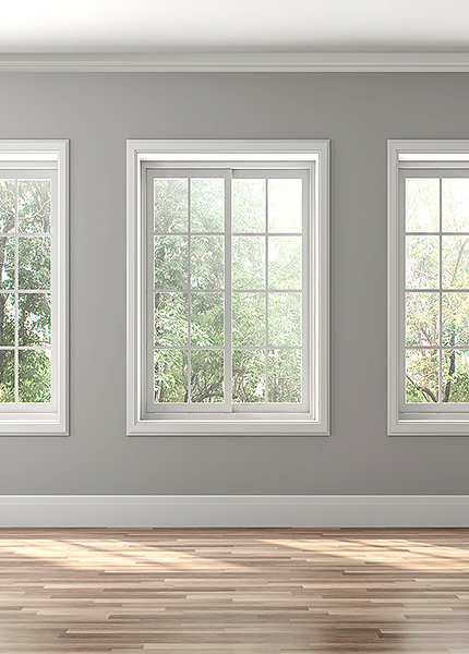 Three large windows with trees
